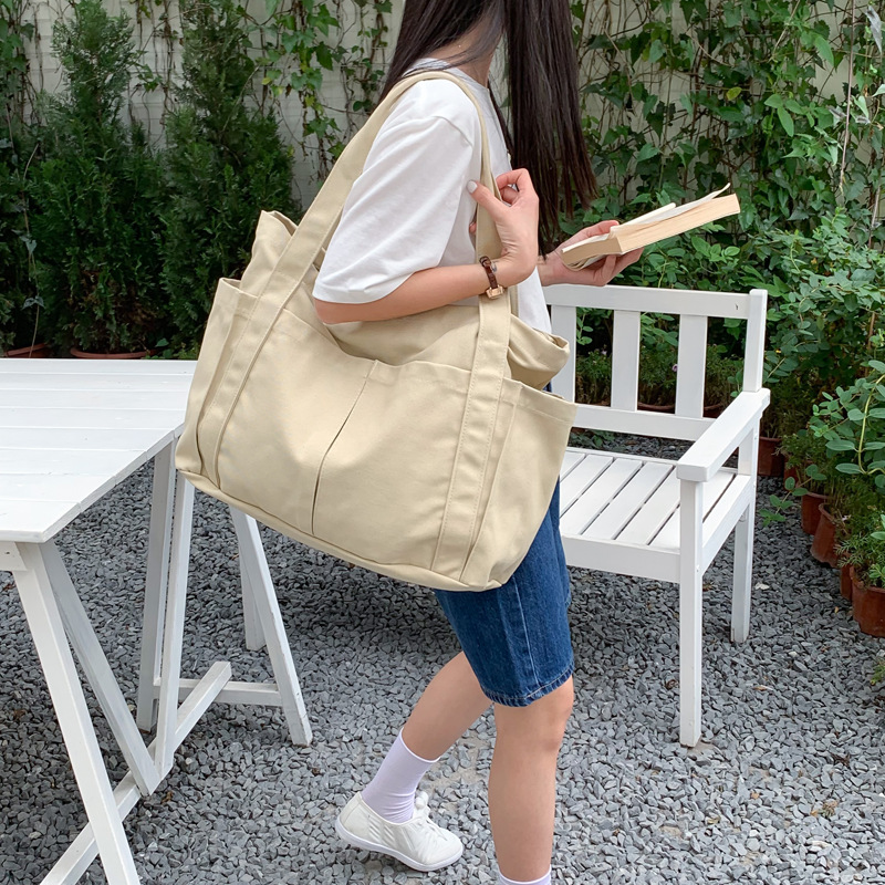キャンバストート ゆとりポケット付き 多機能トートバッグ