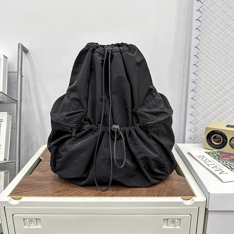 https://fulmo-img-server.com/tsutsumin-bag/06e6ab82-f392-4696-b9d3-6f88663bfdde.jpg