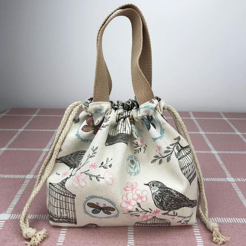 巾着 小鳥と鳥かご柄の巾着ポーチ