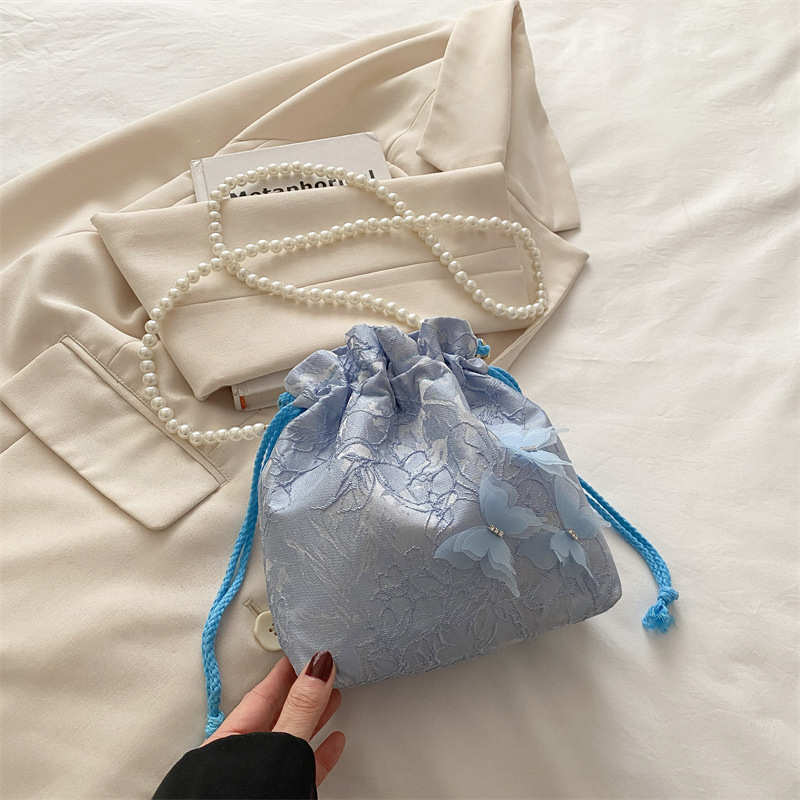https://fulmo-img-server.com/tsutsumin-bag/52abf3a1-b9f0-4b49-8438-3a107af68ae1.jpg