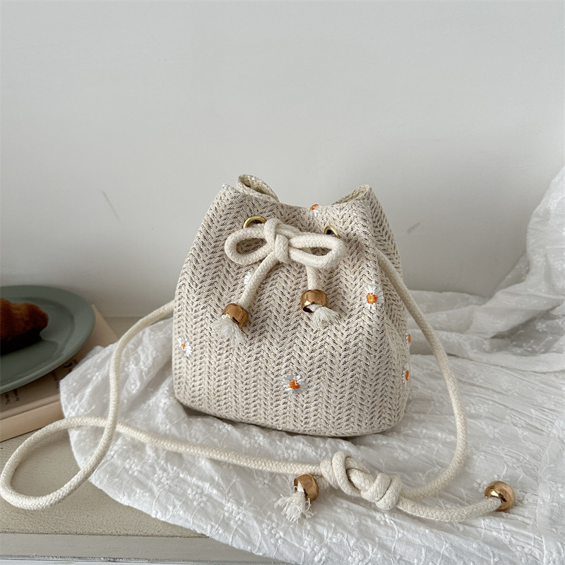 巾着 小花刺繍ヘリンボーン織り巾着ポーチ