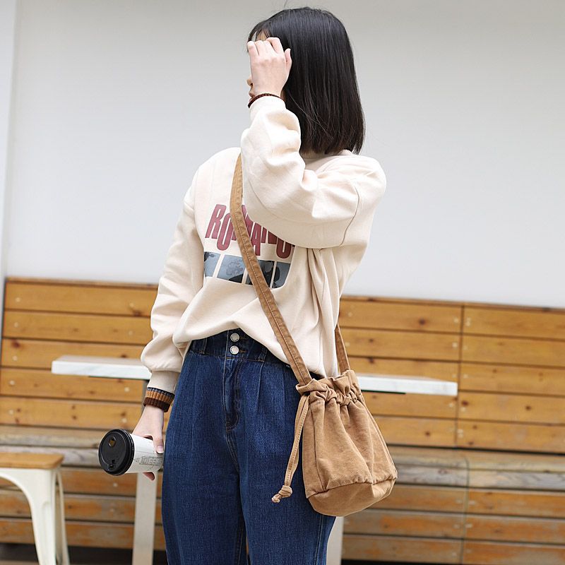 巾着 柔らか素材の丸底巾着ショルダーかばん