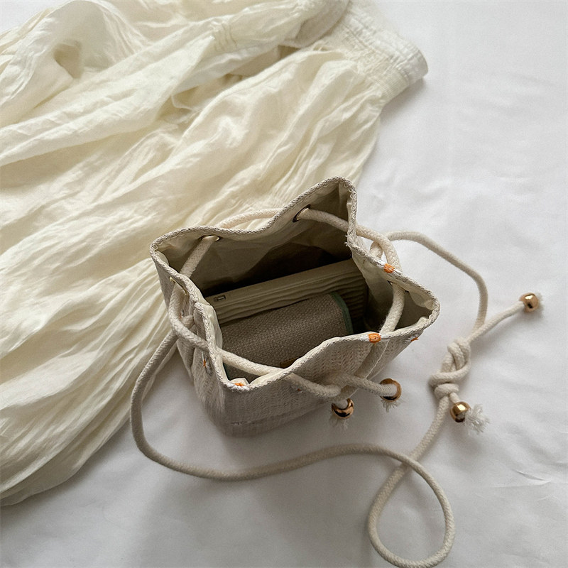 巾着 小花刺繍ヘリンボーン織り巾着ポーチ