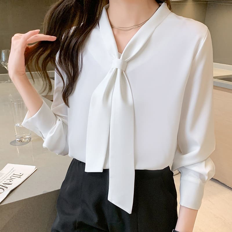 骨格ウェーブ服ボウタイブラウストップス