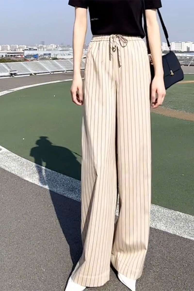 40代ファッション レディース この画像はドレスではなく、パンツスタイルのアイテムを示しています。したがって、ご要望のドレスのと説明を作成することはできません。